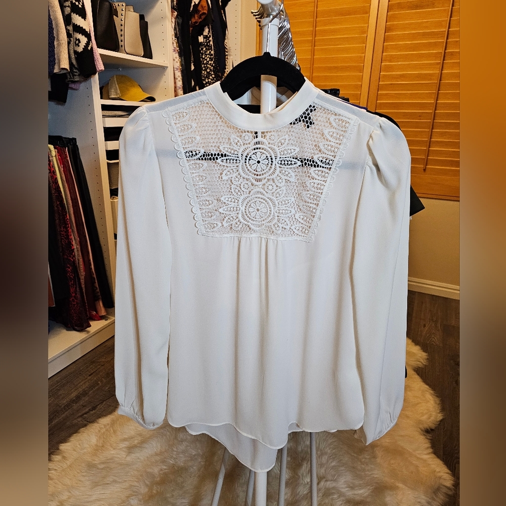 Express off white, lace bib, mock neck blouse. Size S.